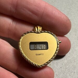 Gold Tone Heart Quartz Pendant Watch it does work